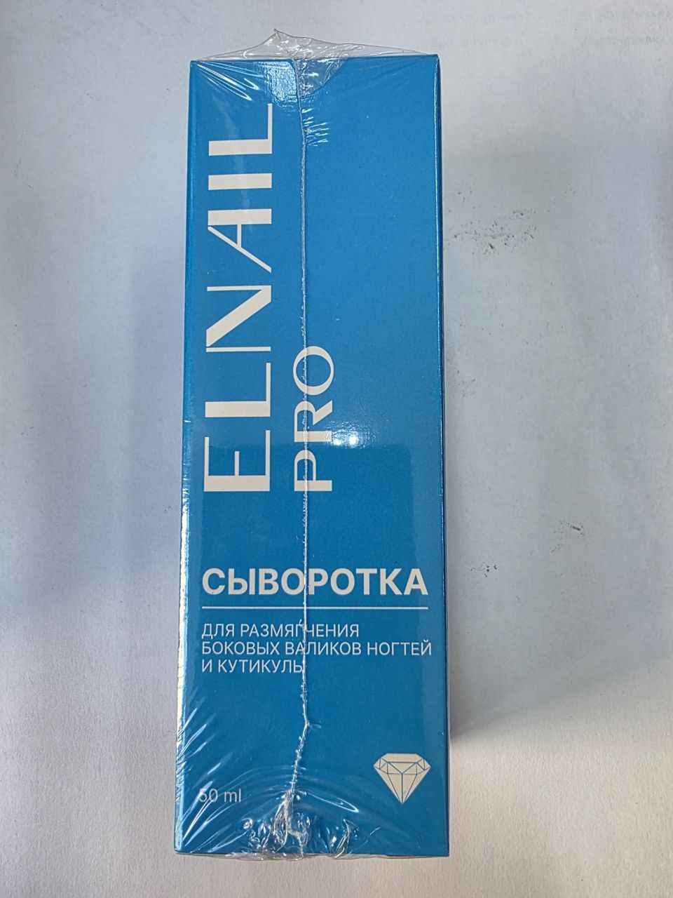 Elnail Pro, Сыворотка для размягчения боковых валиков нотей и кутикулы, 50мл